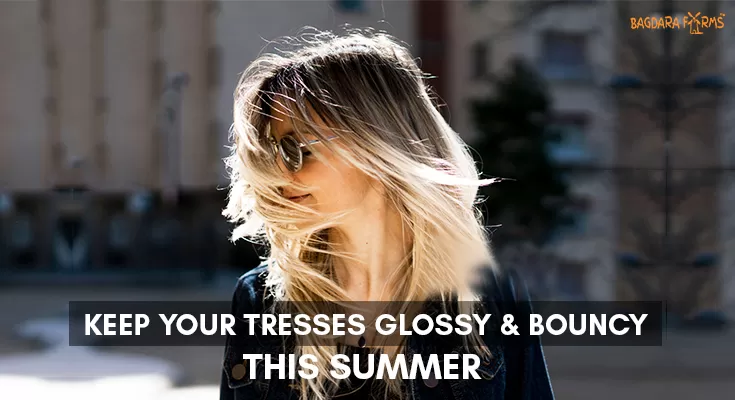 KEEP YOUR TRESSES GLOSSY AND BOUNCY THIS SUMMER
