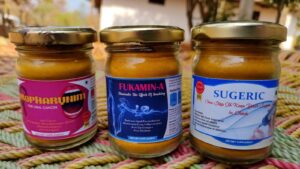 Three products from Bagdara Farms - Sugeric, Fukamin-A, and Oropharynim. Each product is labeled with its name and features a jar of organic turmeric powder with a green and white label