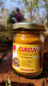 An image of a bottle of Curevy, a natural turmeric-based supplement for weight loss and fat reduction from Bagdara Farms. The label on the bottle shows the product name and a graphic of a turmeric root