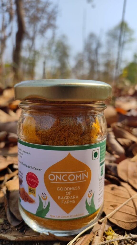 Oncomin bottle with label from Bagdara Farms, a turmeric-based dietary supplement for cancer prevention and treatment