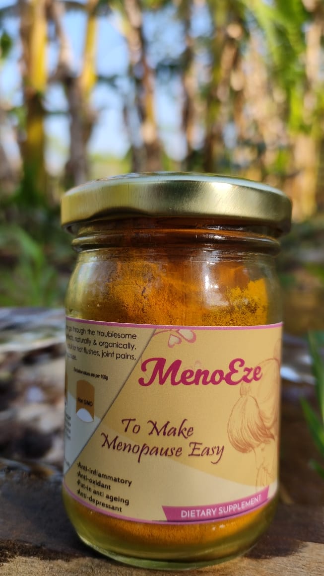 Bottle of Menoeze dietary supplement made with organic turmeric from Bagdara Farms.