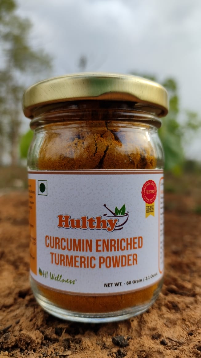 A close-up view of Bagdara Turmeric powder in a jar. The vibrant yellow color and fine texture of the turmeric can be seen, representing its high quality and purity. Bagdara Turmeric is known for its potential health benefits and culinary uses."