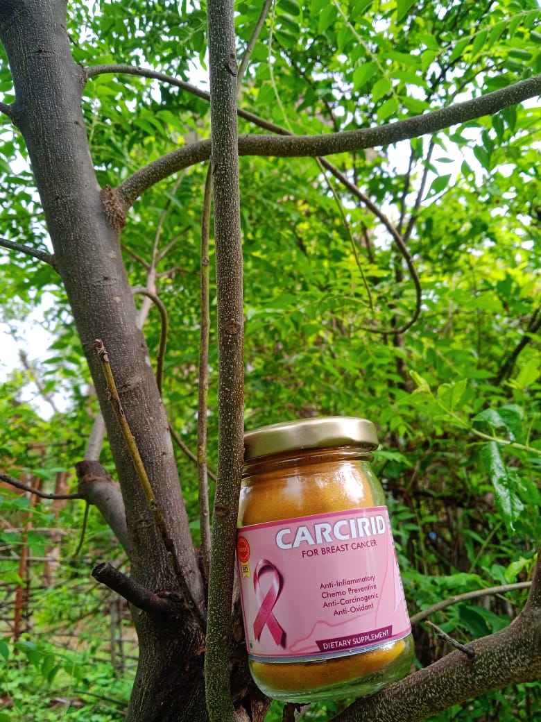 Bottle of Carcirid, a turmeric-based supplement for Breast Cancer patients considering hormonal therapy.